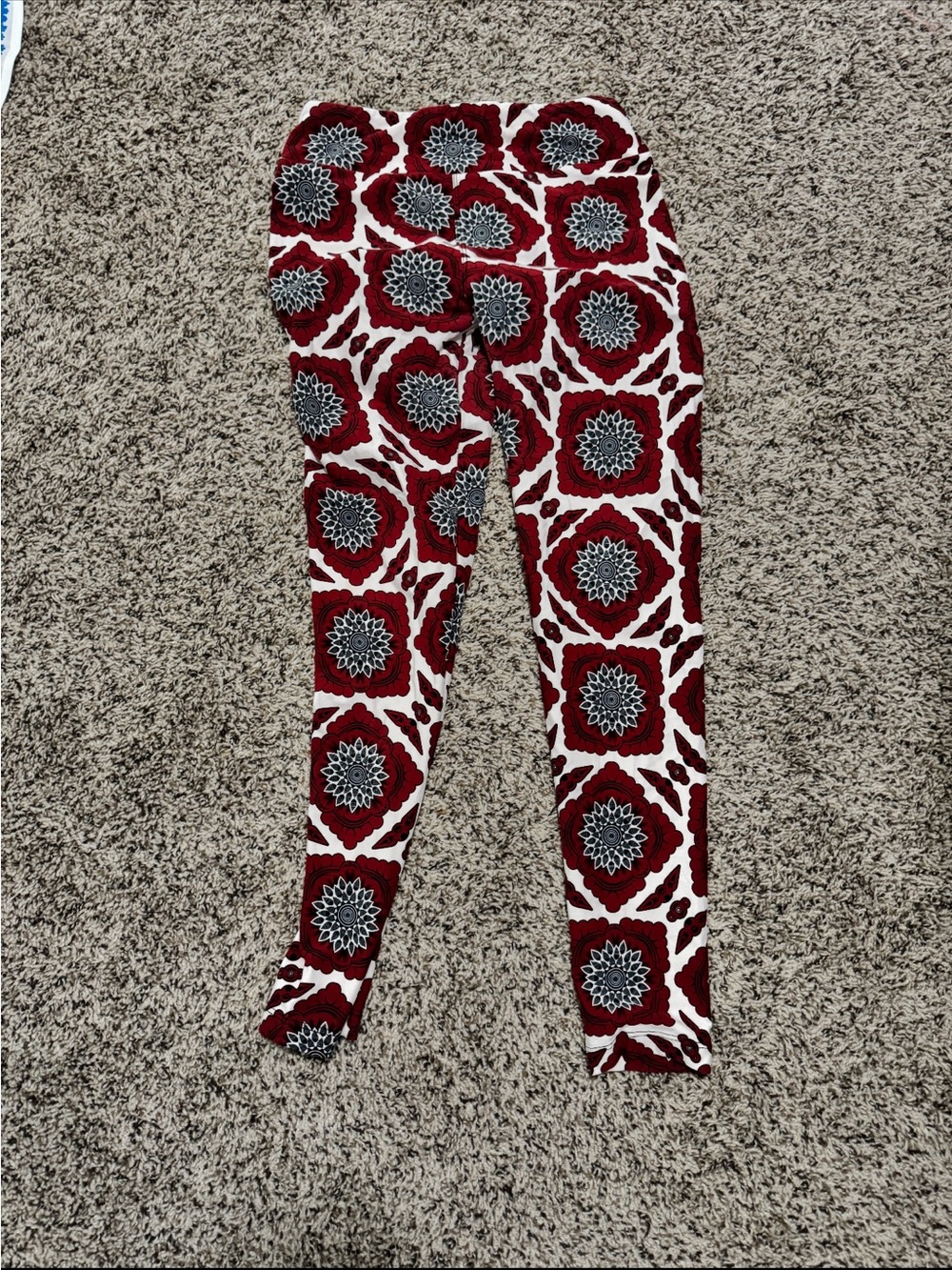 Lularoe woman’s Burgundy and White Floral Patterned Leggings